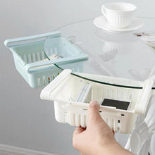 Adjustable fridge basket, showing expansion feature